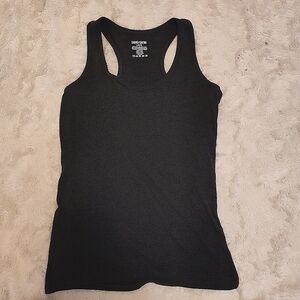 This is a charcoal grey tank top, size Large, from Caramel Cantina.